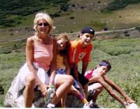 Barbara Biesecker enjoys a hike with her family during a recent vacation.
