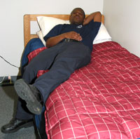Darryl Lowery enjoys a rest in one of the firehouse bunk-rooms after working a long shift.