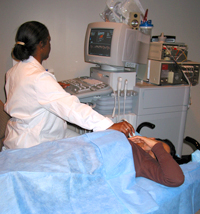 Diane Johnson performs a sonography procedure on a patient that takes about 30 minutes to complete.