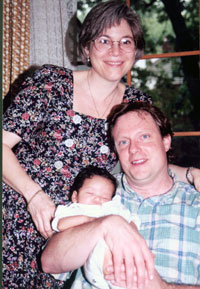 A family photo of Elise Kohn, her husband and son.