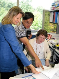 Gloria Stables and her colleagues discuss a research report