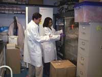 Greg Tate conducts a laboratory survey to ensure safe storage of chemical and biological agents.