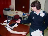 Lt. Col. Harvey is pictured with a prosthesis that helps increase independence of an amputee.
