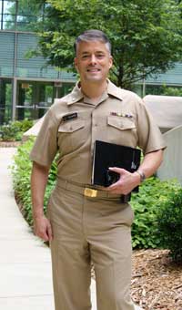 Kelly Richards has a dual track career, working as an NCI nurse and serving as a Commander in the United States Health Service (USPHS) Commissioned Corps. He is pictured in his USPHS uniform. 