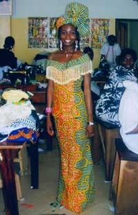 Kevilin wearing the traditional dress of Ghana on a recent trip to that country.