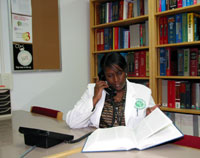 Leslie Adams responds to physician’s inquiry on the telephone.