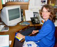 Lynne Haverkos accomplishes many of her daily administrative tasks at her desk.
