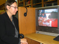 Manon reviews audiovisual resources in the library's collection