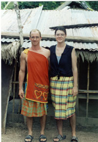 Matthew Scherer poses with his wife in costume while serving in the Peace Corps.