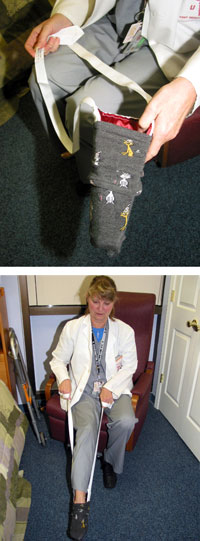 Nancy Bernier demonstrates the use of a sock aid - a device that helps patients put on their socks.