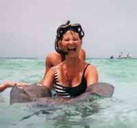 Nancy Bernier holds a stingray she encountered while snorkeling on a family vacation.