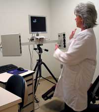 Sherri Gollins uses a specialized camera that produces three-dimensional images to evaluate a patient's soft tissue facial features.