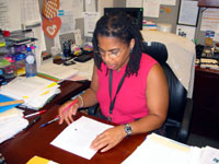 Victoria Cargill working at her desk.